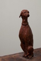 Metaphysics with a High Probablility of Success, Ceramic, 33.5H x 14W x 4D Inches A ceramic sculpture by Michael Hermesh that depicts a man flying a balloon with a dog at his side